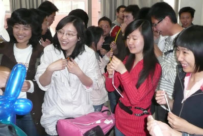 The students loved trying to blow up the balloons.
